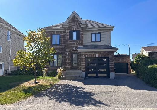 Two or more stories for sale - 6506 Rue Valade, Ste-Rose, H7L4L4